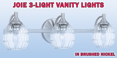 Ashley Harbour Joie 3-light vanity lights, our price $39, compare online for $106.16. Brushed nickel fixture with elongated hexagon picket shaped glass shades, item number DS19194A. 22 inches wide by 6 inches deep by 6 and a quarter inches high. Dimmable when paired with dimming-compatible bulbs. Can be installed facing up or down. Styles may vary by store. Hurry in for best selection. These are a special buy folks, so when they’re gone, they’re gone!